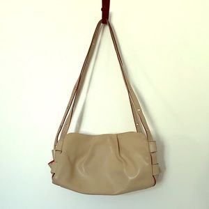 Nannini tan shoulder bag, red lining